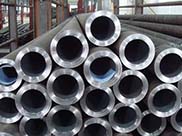 Method for preventing quenching cracks of medium and high carbon low alloy steel pipes