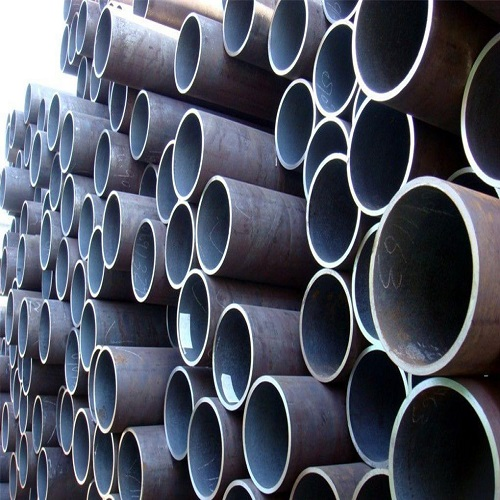 What three processes are included in the heat treatment of carbon steel tubes?